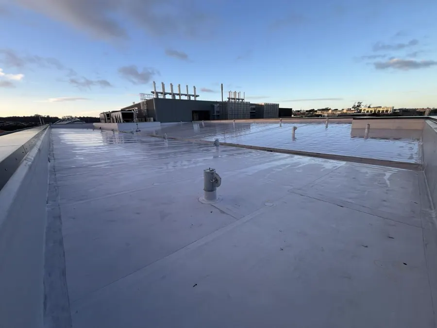 Large single-ply membrane roof on an Auckland university building